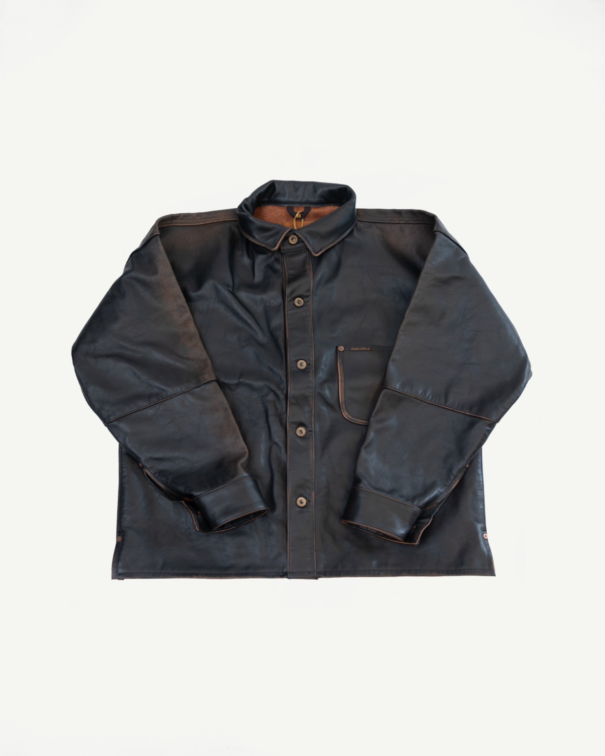 Front view flat lay of a dark brown leather button-down shirt with a collar and long sleeves.