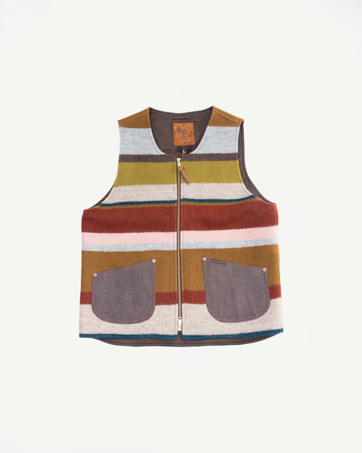 Front flat lay of striped wool vest with contrast pockets, zipper, and leather tag
