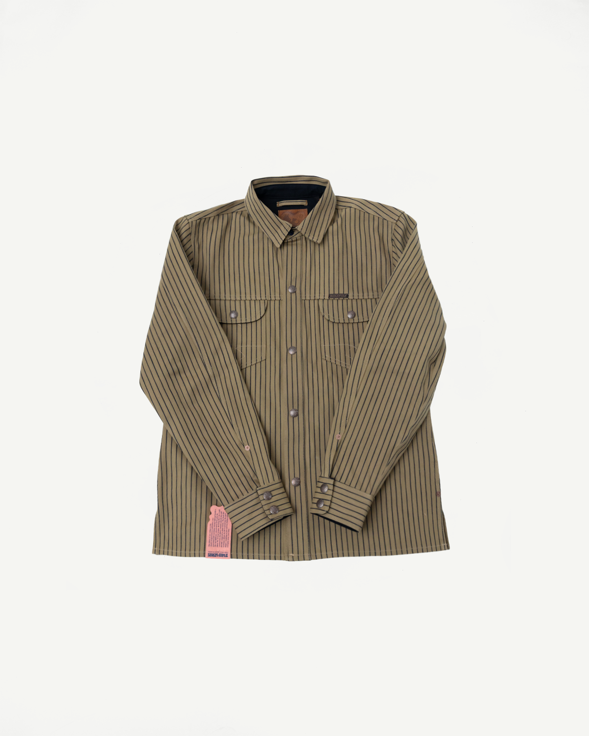 Flat lay of front of beige indigo striped shirt jacket, shows collar, chest pockets, and button cuffs.
