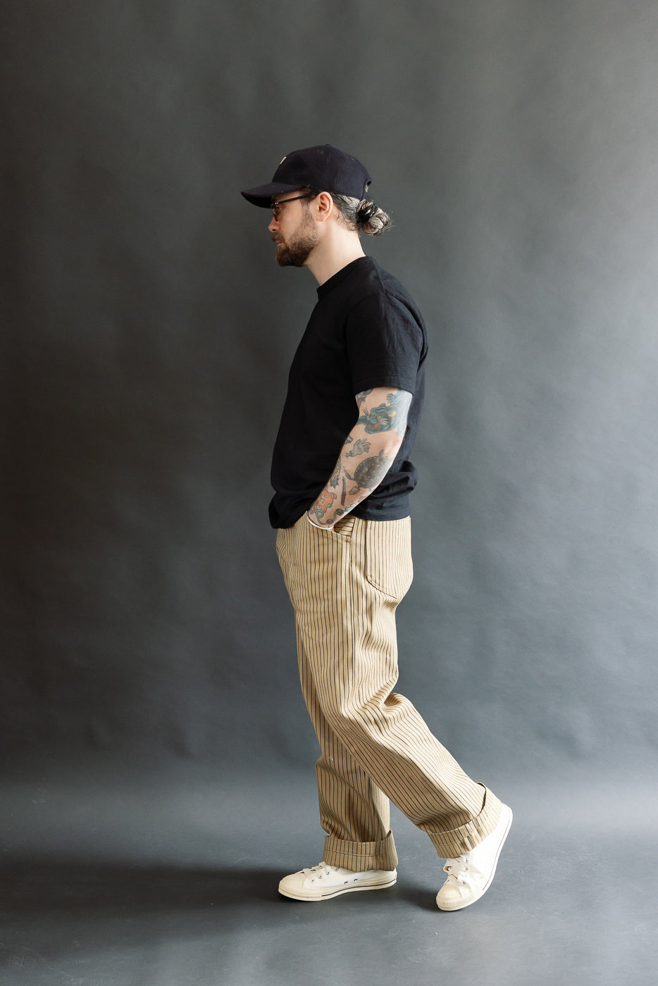 Full body side view of male model, 5'9