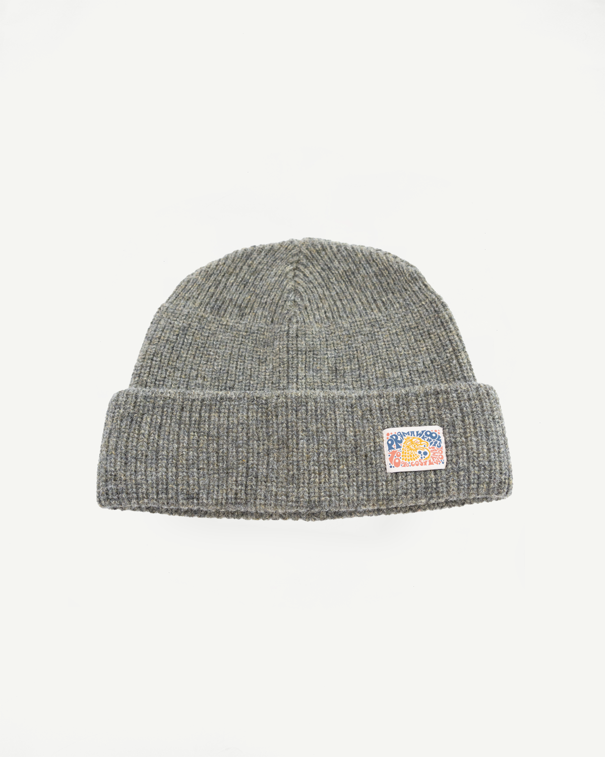 Front view of a grey ribbed knit beanie with a colorful logo patch on the cuff.