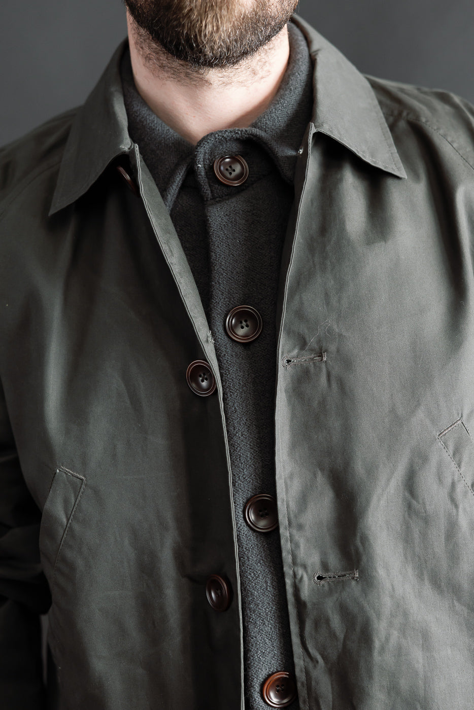 Close-up front of Indigofera Raven Coat on male model 5'9