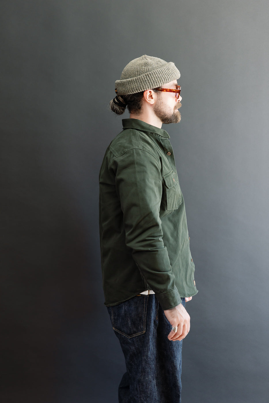 Side profile, full body shot of a 5'9