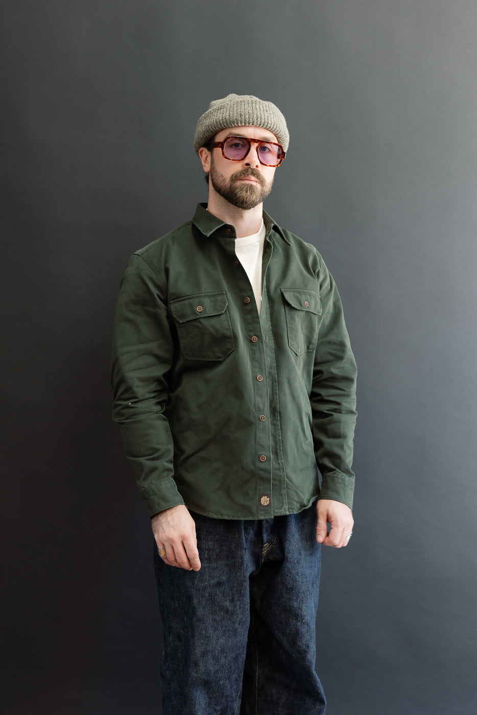 Full body front view of a male model, 5'9