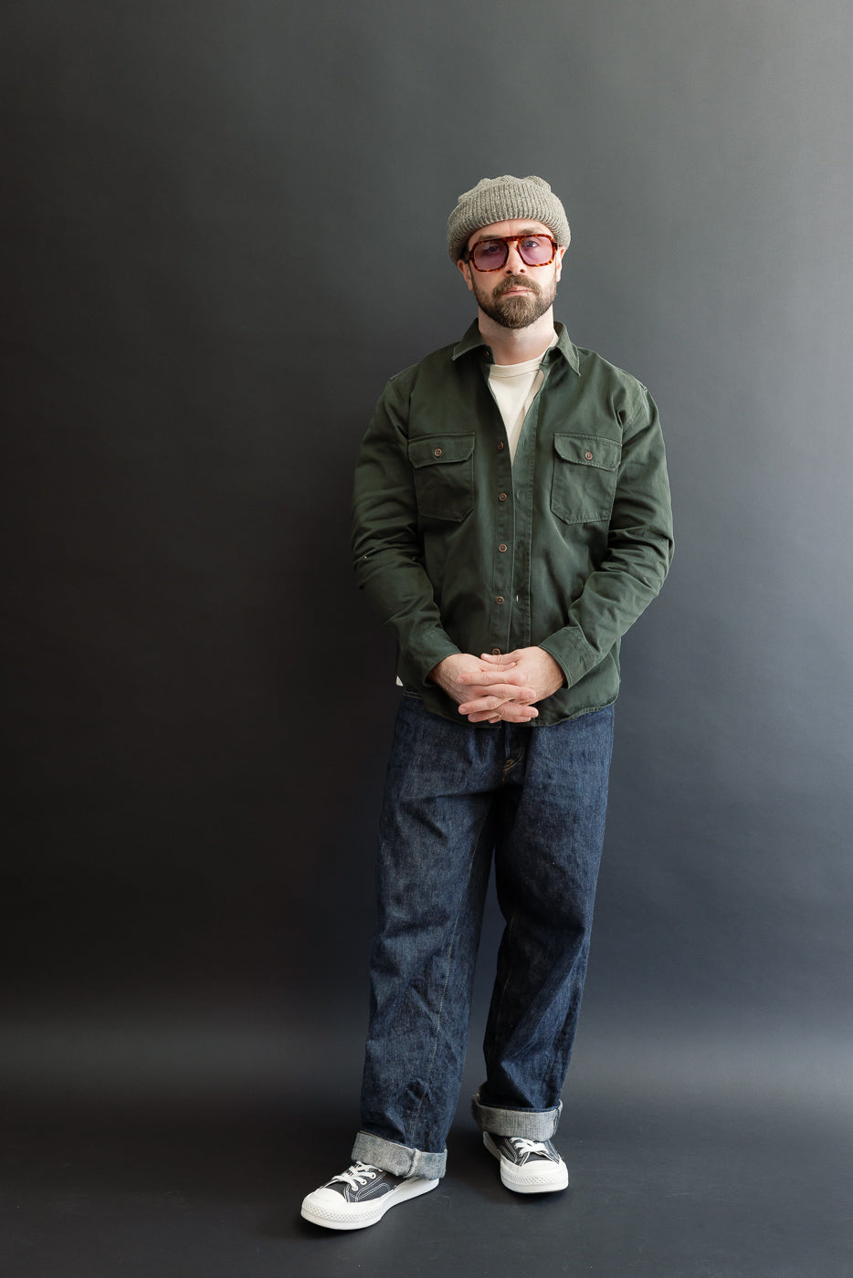 Full body front view of a male model, 5'9