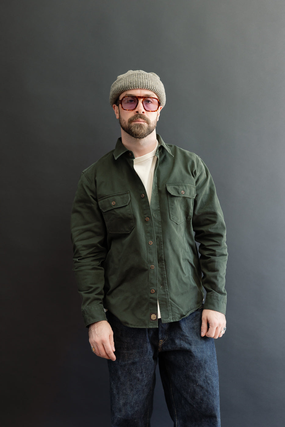 Full body front view of a male model, 5'9