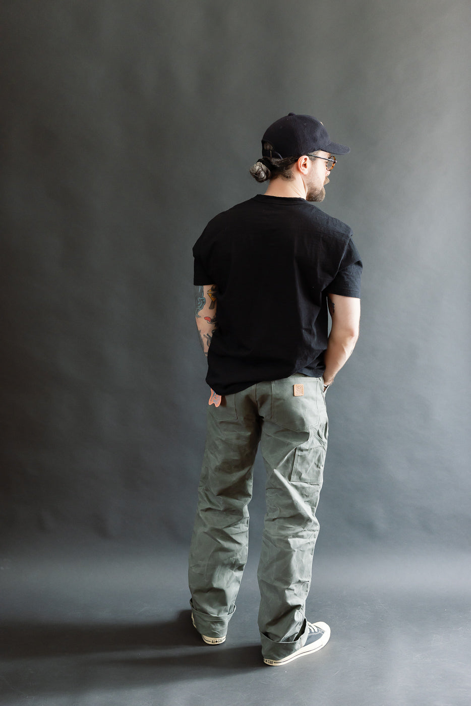Full body rear view of male model 5'9