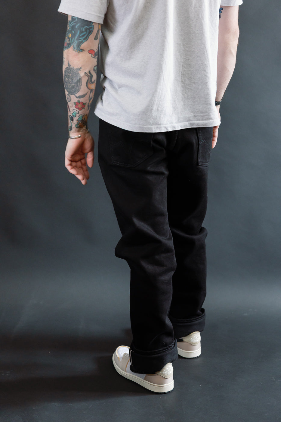 Back view mid-close-up of male model 5'9