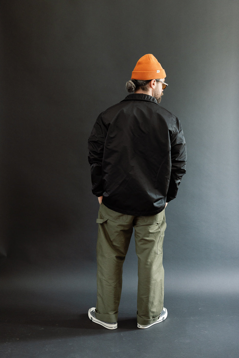 Full body back view of male model 5'9