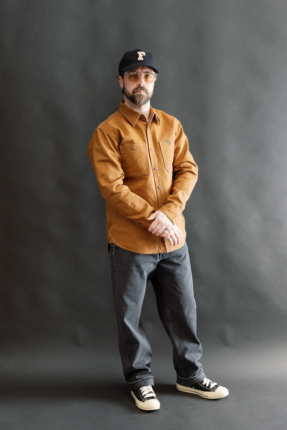Full body front view of male model 5'9