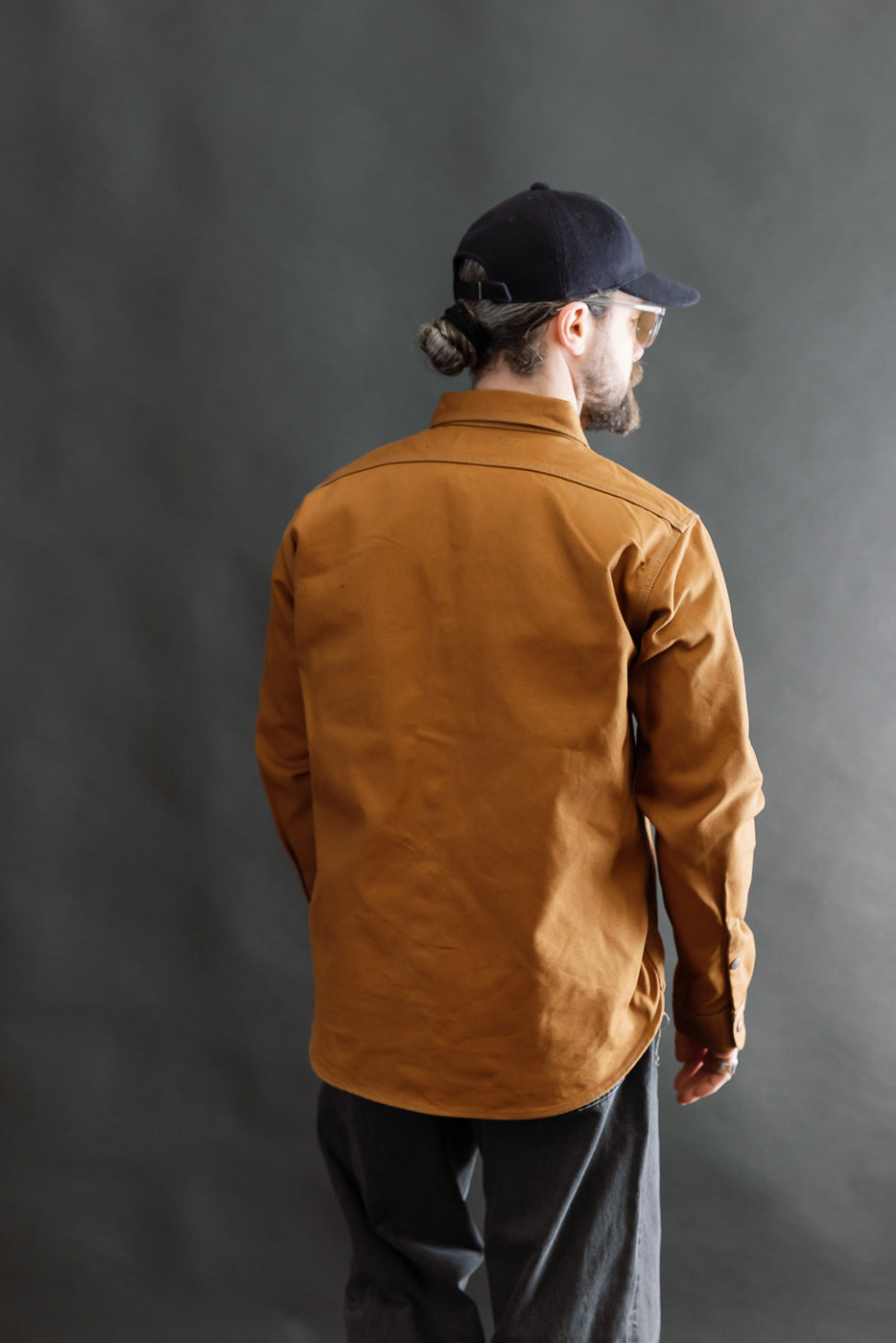 Full body rear view of male model 5'9