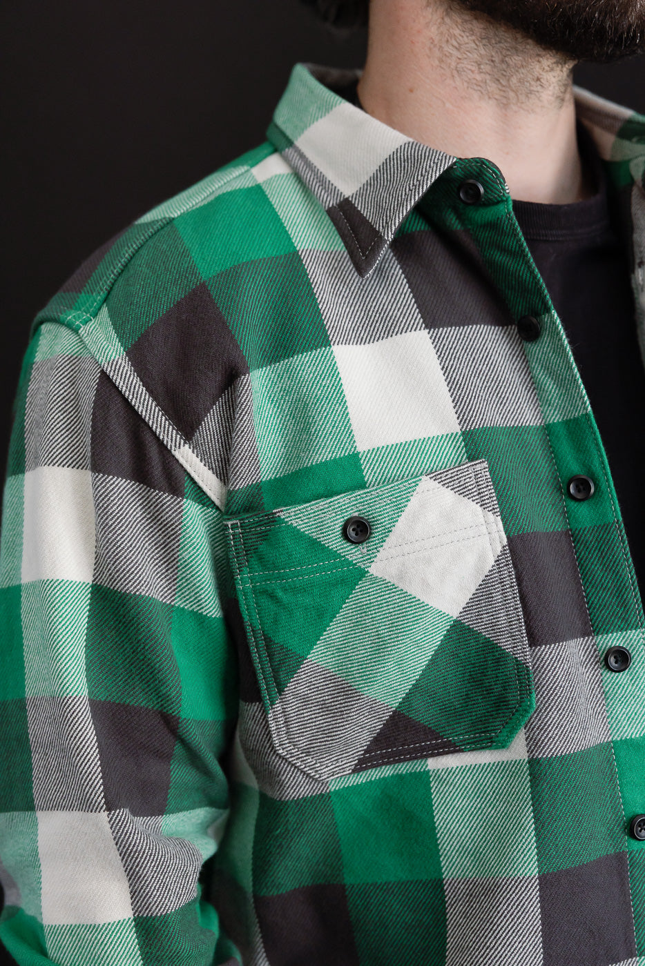 Close-up, front left chest of Iron Heart IHSH-428 ultra heavy green flannel shirt on 5'9