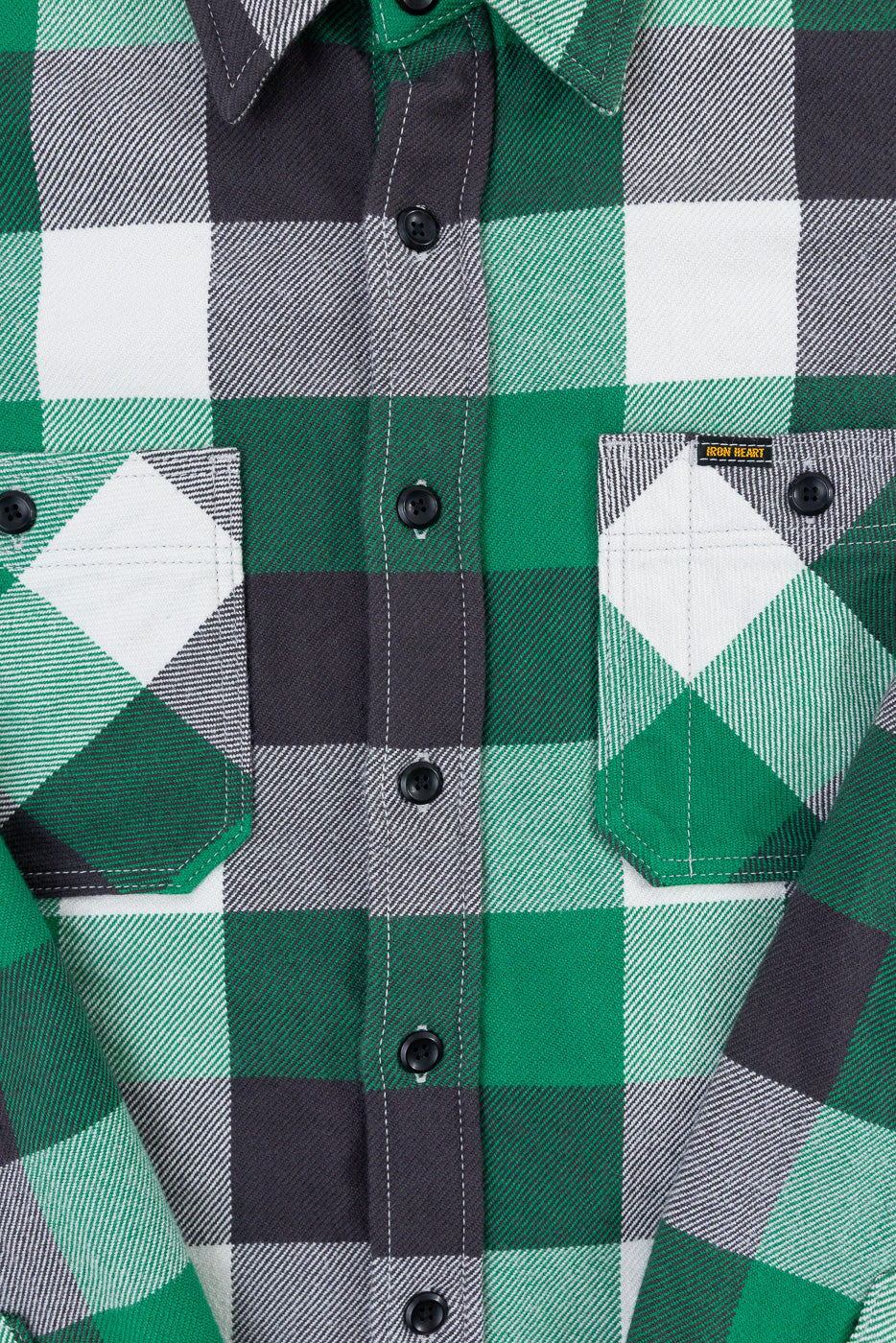 Close-up front view Iron Heart ultra heavy flannel work overshirt, green plaid, snap buttons, dual chest pockets, Dant shop.