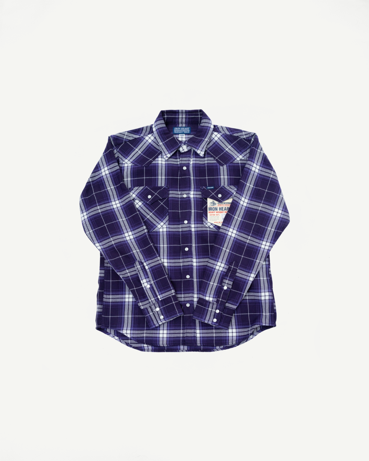 Purple and white plaid flannel shirt, front flat lay view. Features button-down collar, chest pockets, and brand tag visible.