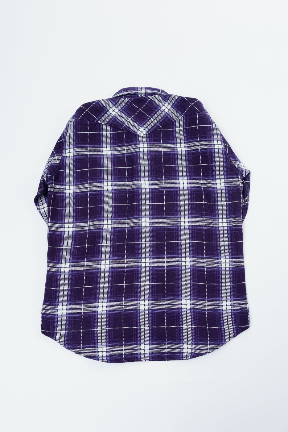 Back view of purple plaid shirt with white grid, flat lay, showcasing collar and hem details