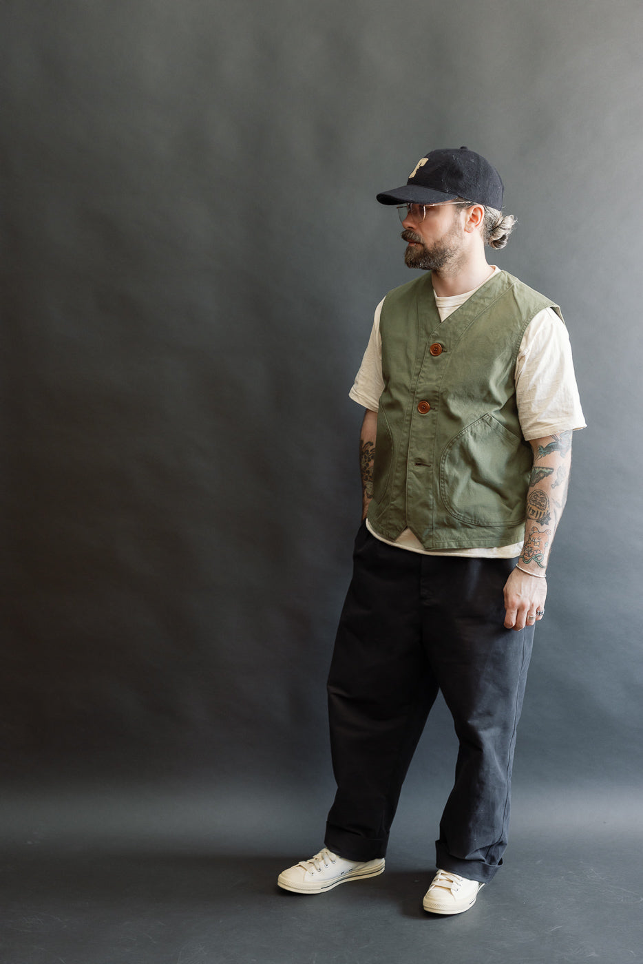 Full body front view of male model 5'9