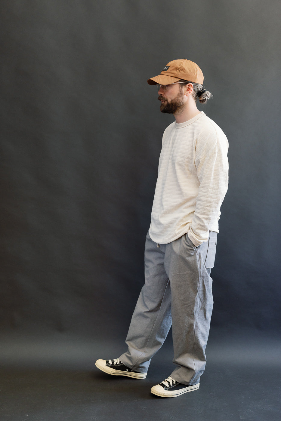 Full body side view of male model, 5'9