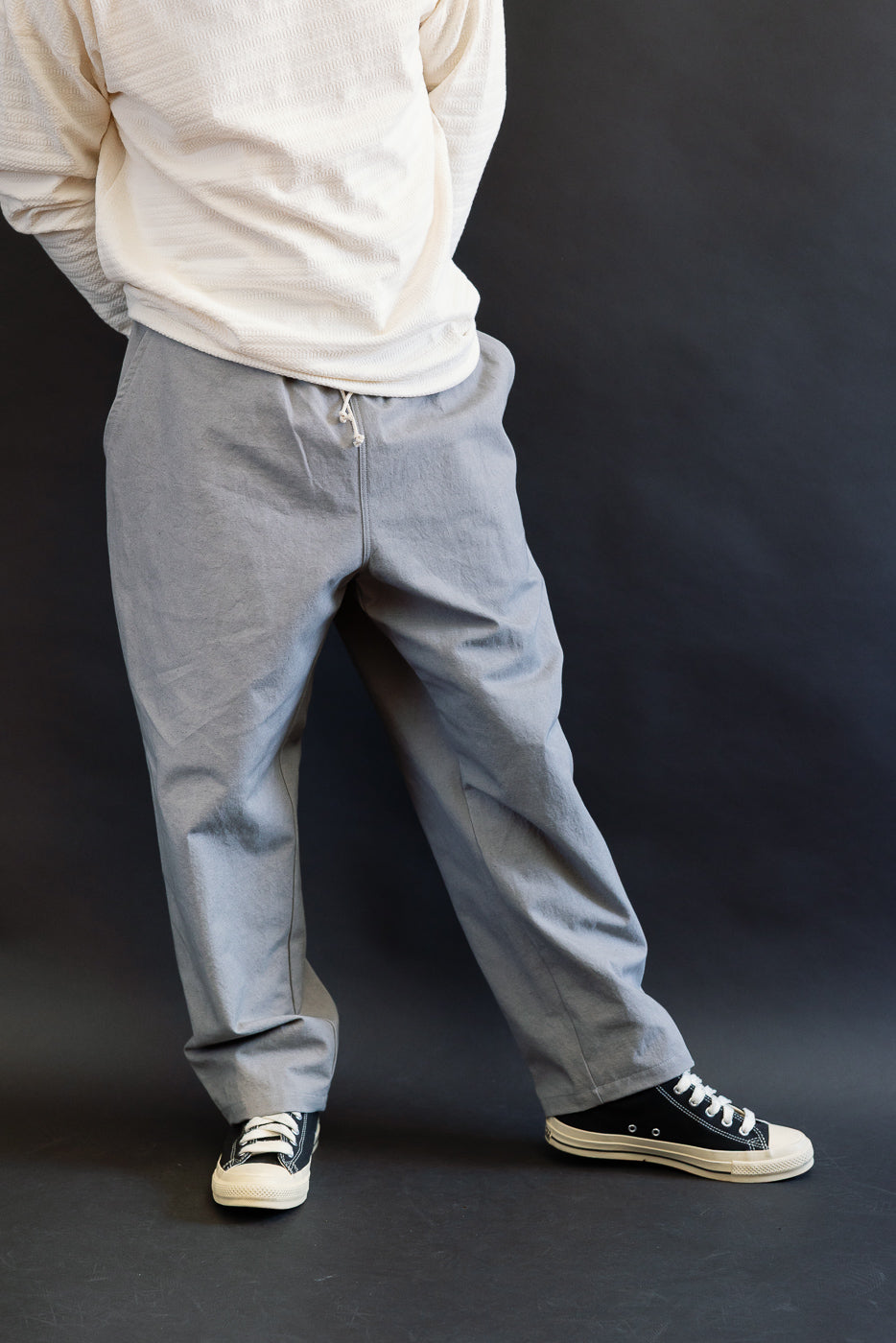 Front view of canvas rookie pants in sordid gray on male model, 5'9