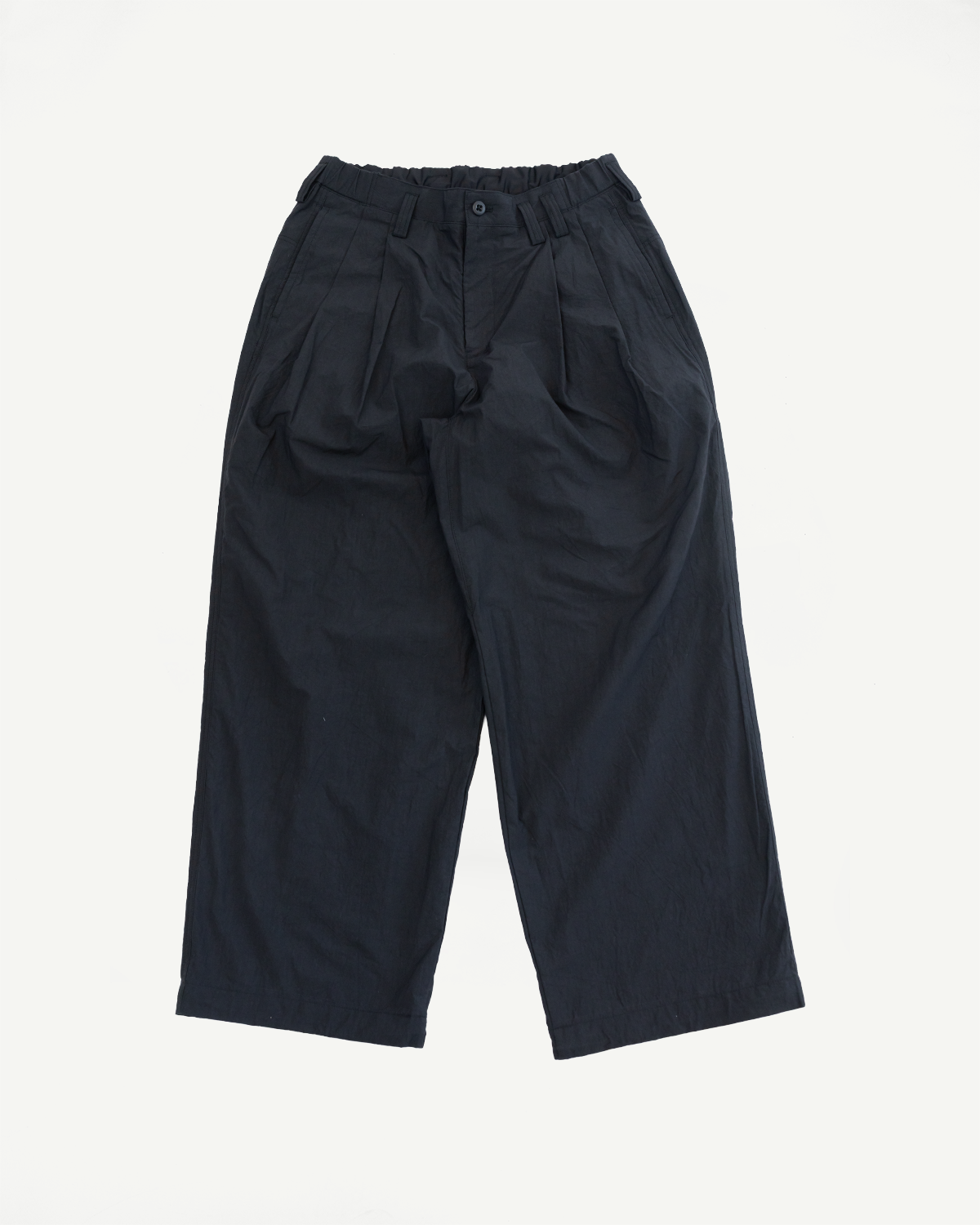 Flat lay front view of black wide-leg casual pants with elastic waist, pleats, and button closure