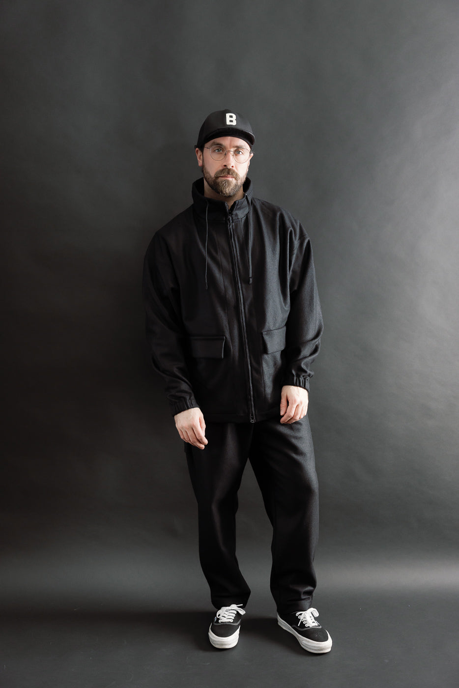 Full body front view of male model 5'9