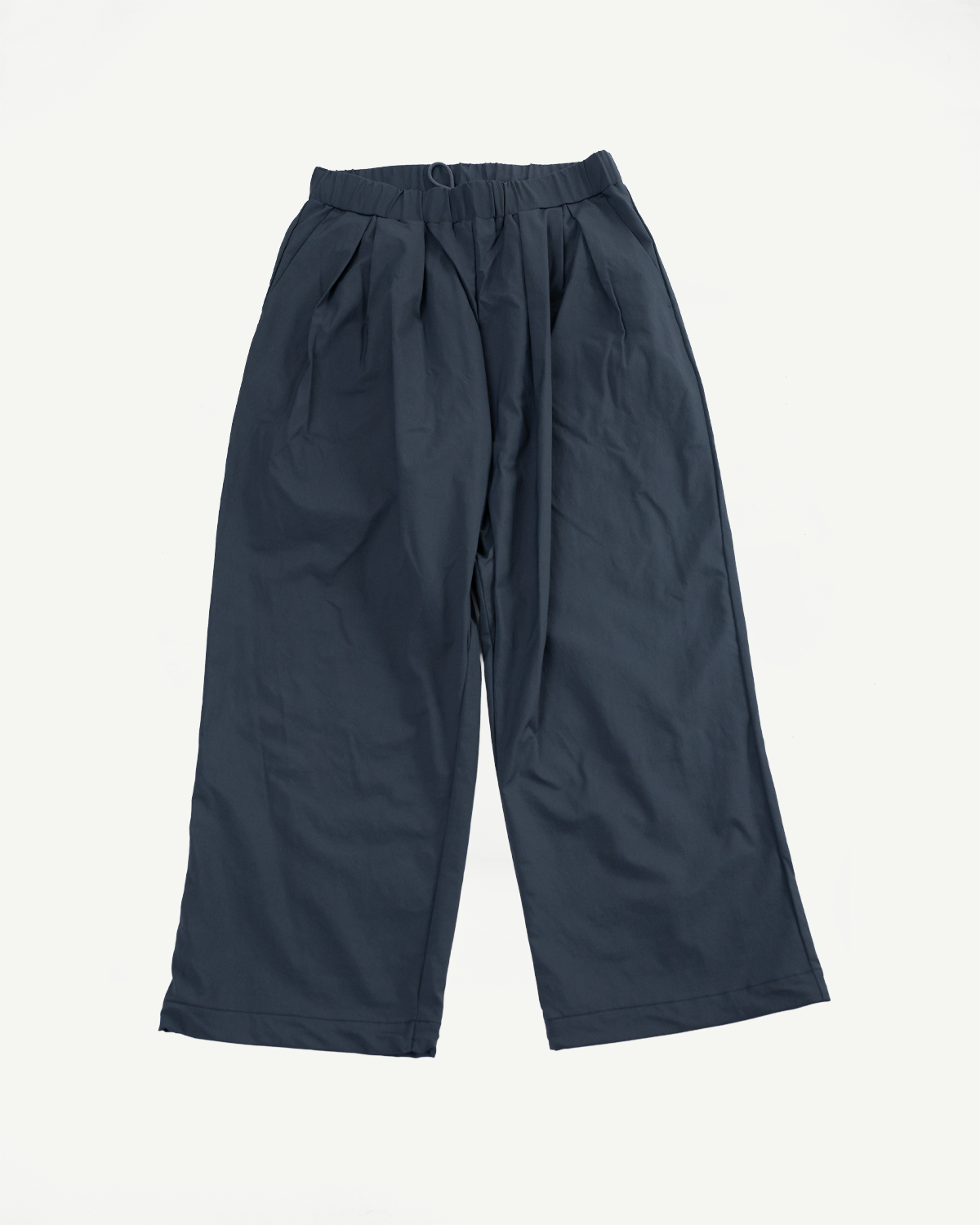 Front view of dark navy wide-leg casual pants with elastic waistband, flat lay