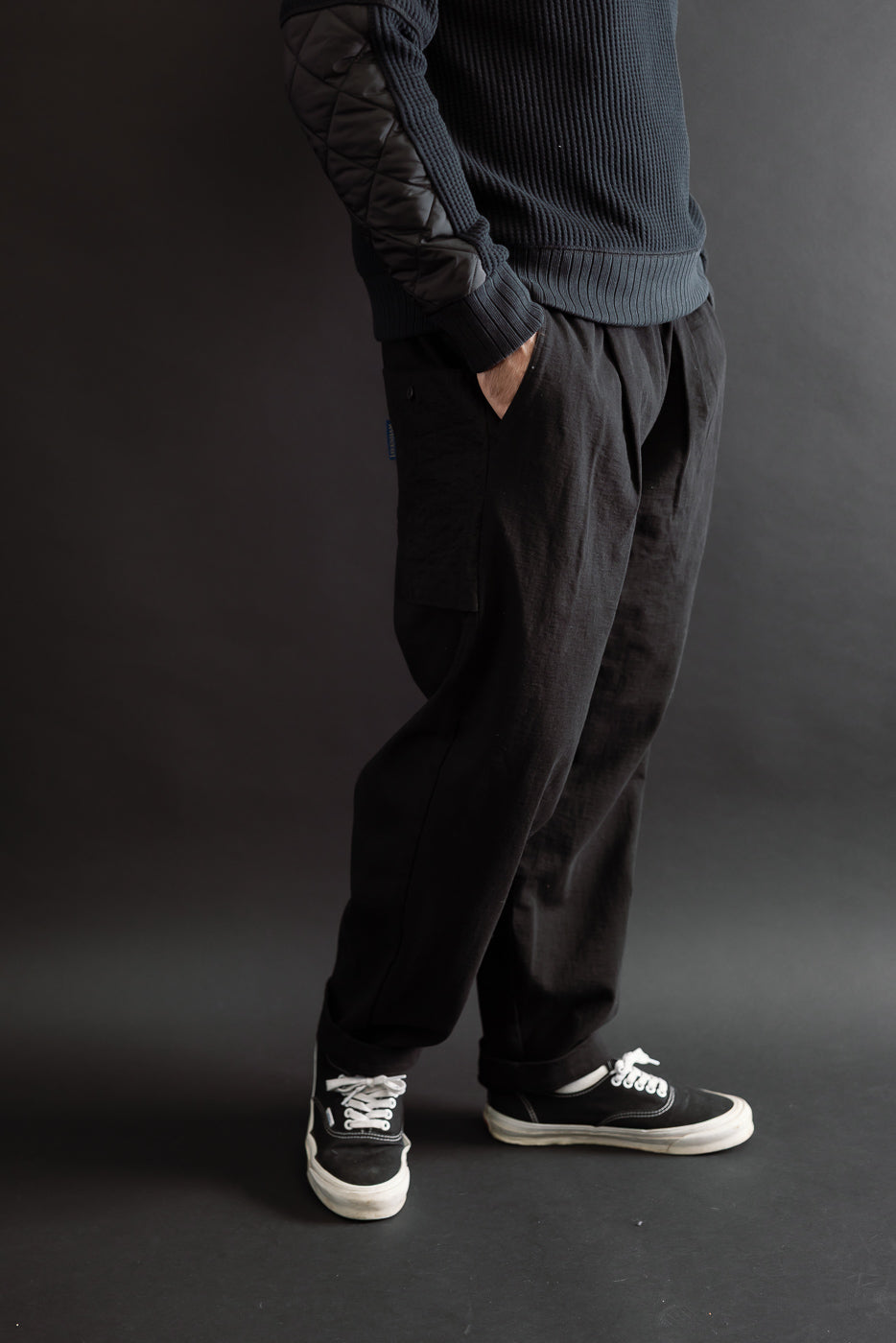 Full body side view of a male model, 5'9