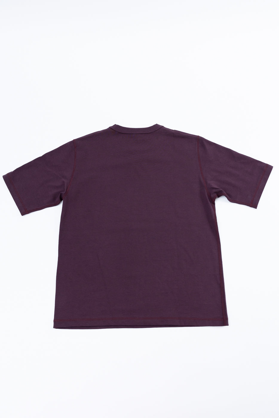 Purple t-shirt on a white background