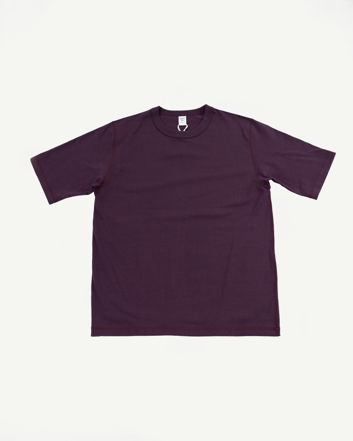 Purple t-shirt on a white background