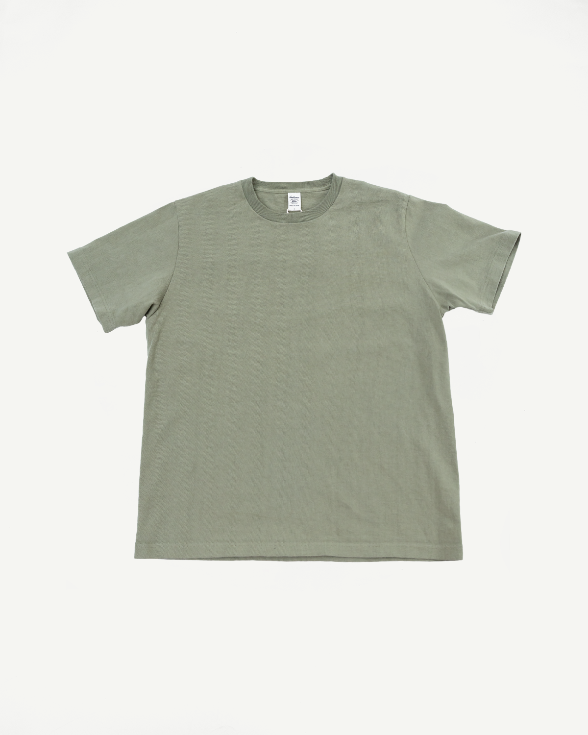 Plain green t-shirt on a white background