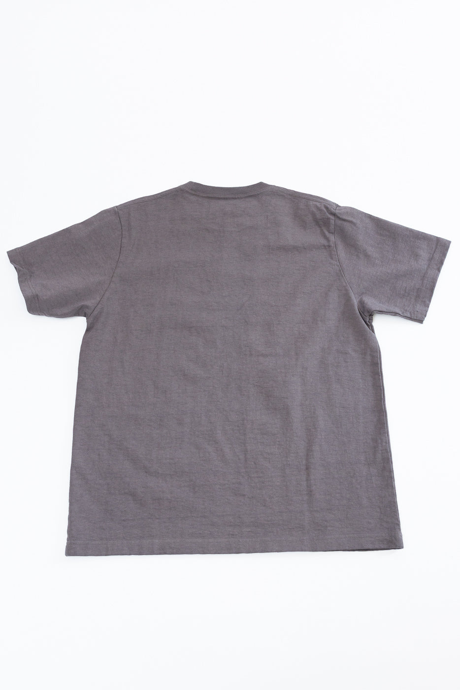 Back view of gray short-sleeve t-shirt, flat lay, showcasing hem and ribbed collar detail
