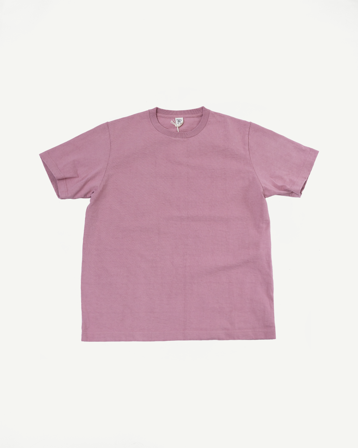 Front view of dusty rose ribbed t-shirt, flat lay, showcasing crew neck and tag detail