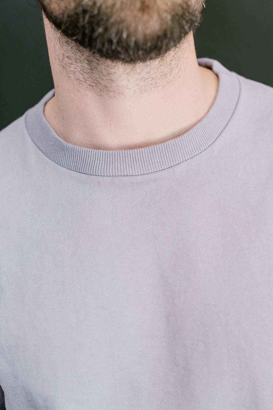 close up binder collar view of purple t-shirt showing ribbing