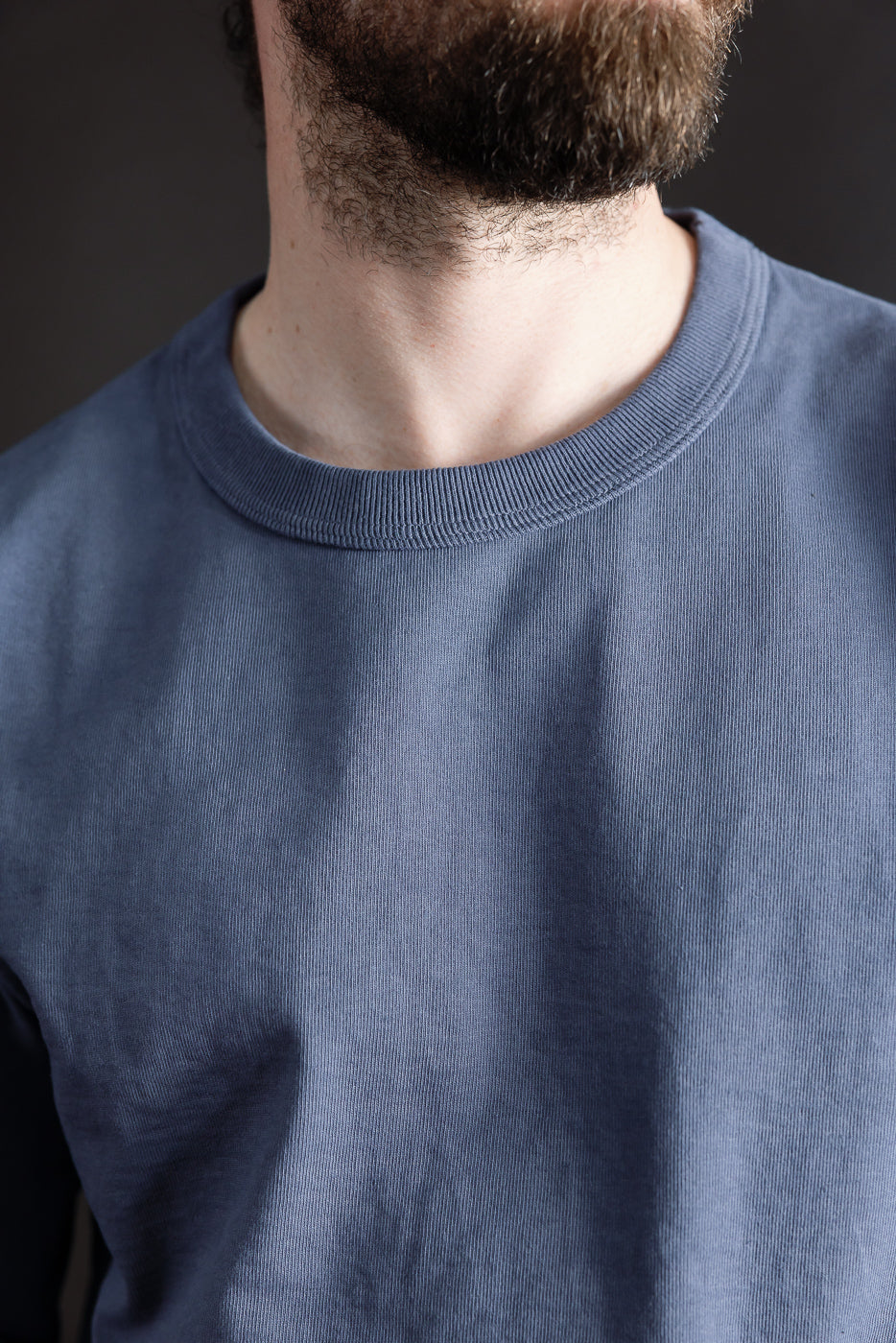 Close-up front of Jackman JM5460 Dotsume LS T-shirt in classic navy on male model, crewneck detail visible, male is 5'9