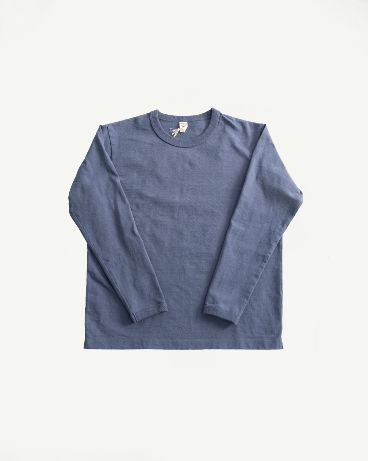 Flat lay of classic navy Jackman JM5460 Dotsume long sleeve T-shirt, front view, crew neck.
