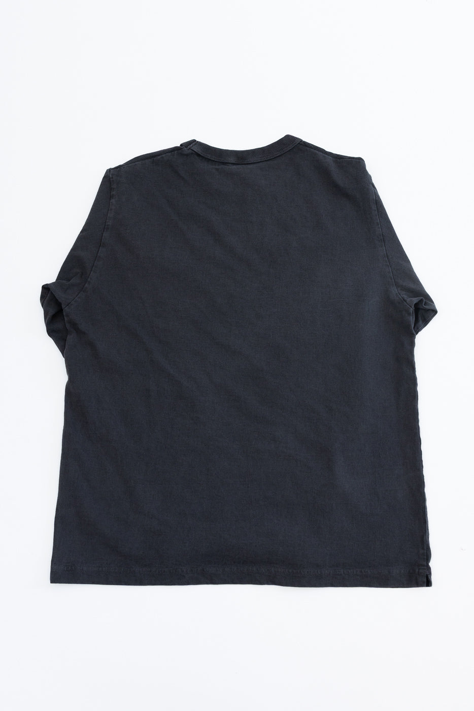 Flat lay back view of dark charcoal crew neck t-shirt with ribbed collar and hem, sleeves rolled