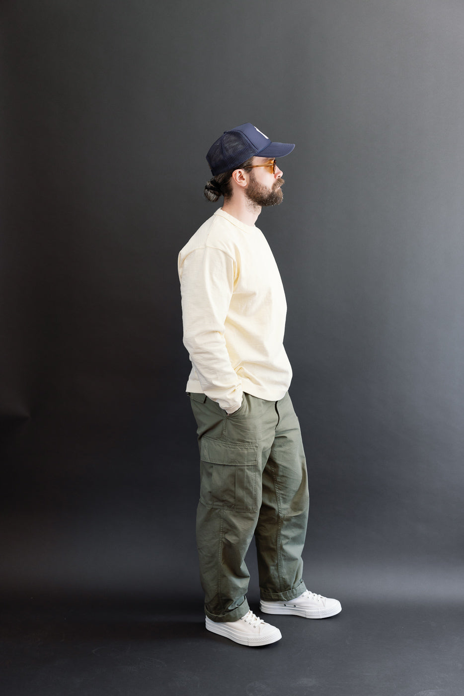 Full body side view of male model, 5'9