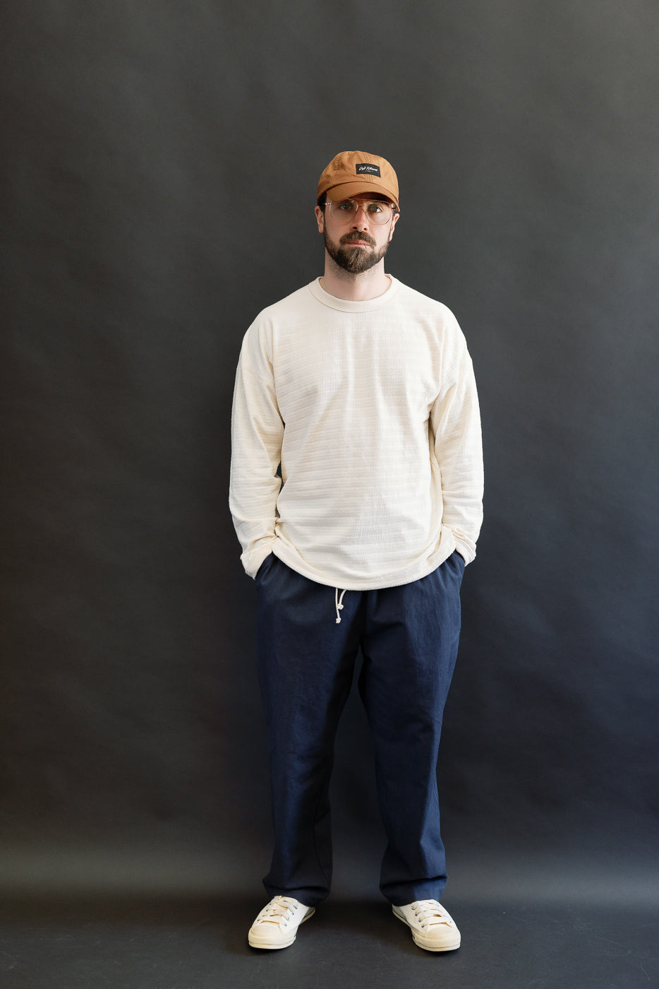Full body front view of male model 5'9