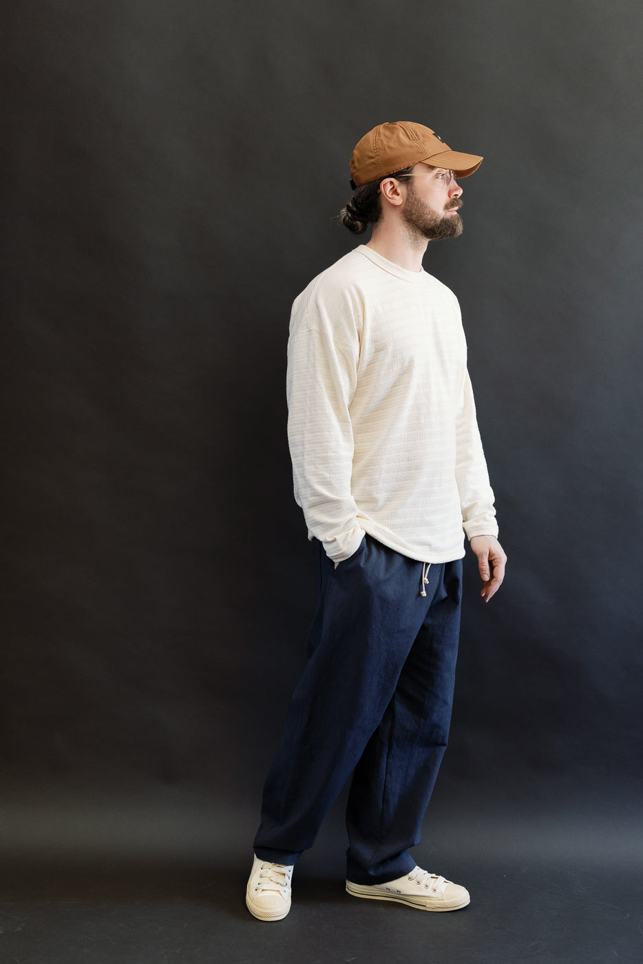 Full body side view of male model, 5'9