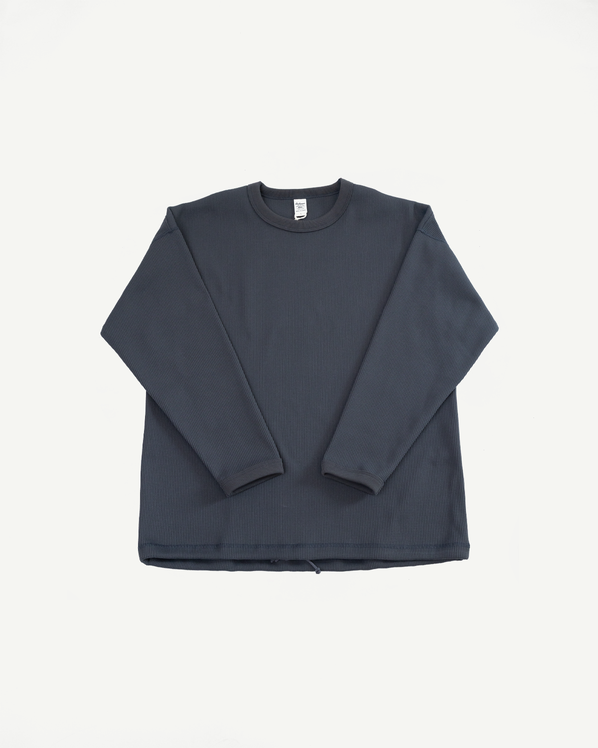 Dark gray waffle knit long sleeve thermal shirt, front flat lay view, ribbed crew neck, tag visible