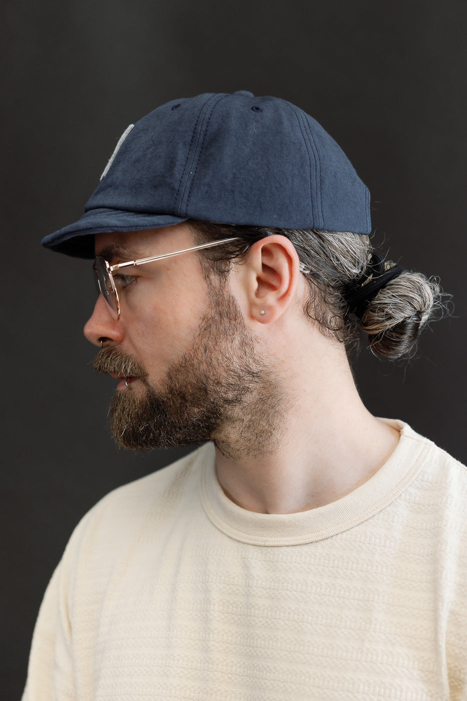 Close-up side view of male model 5'9
