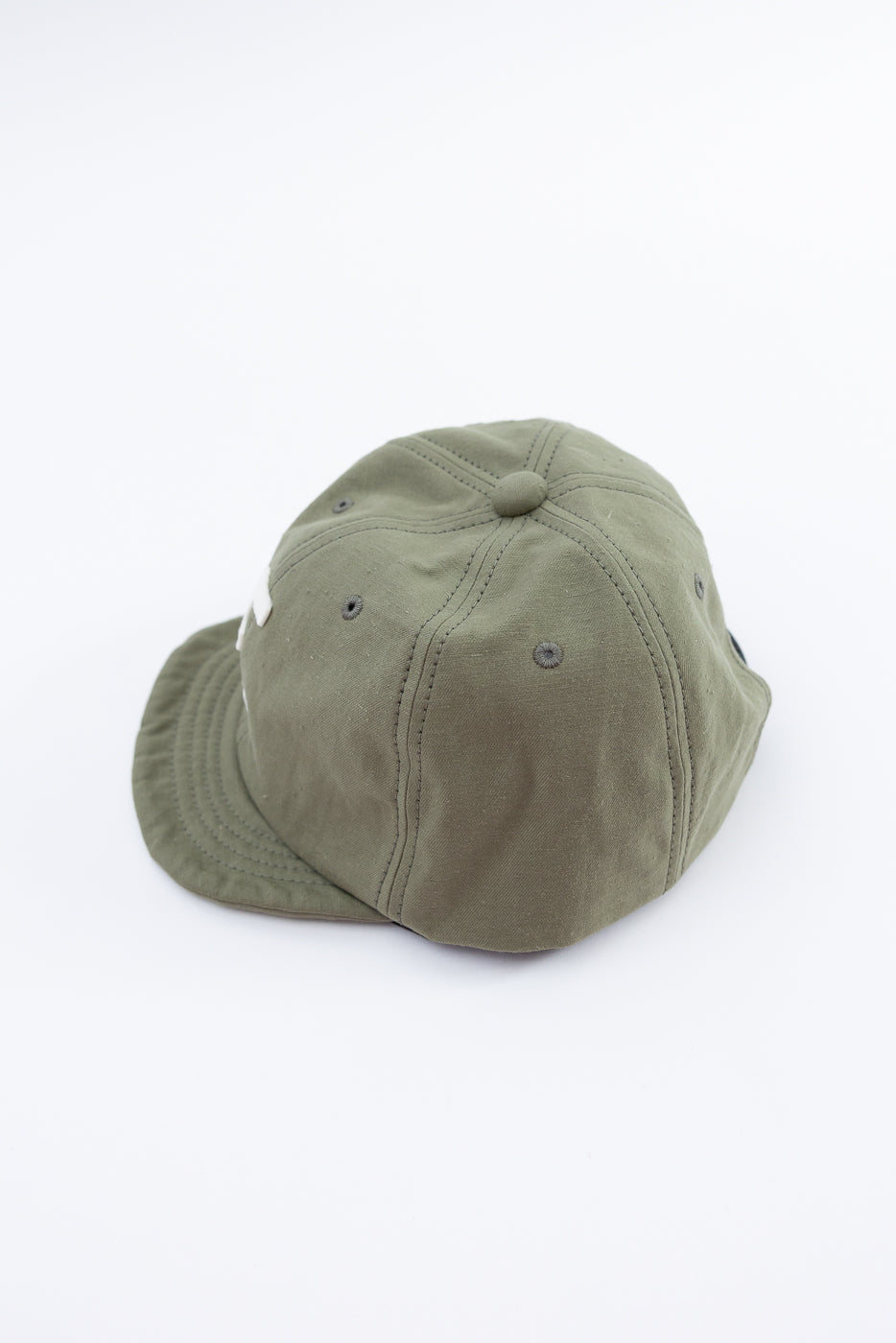 Green bucket hat on a white background