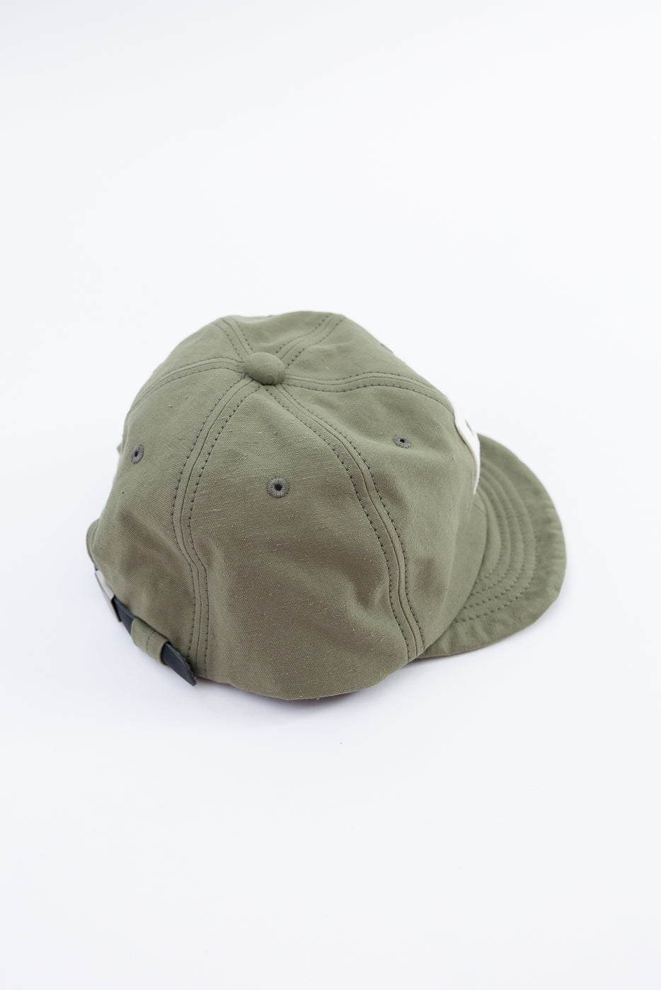 Green cap on a white background