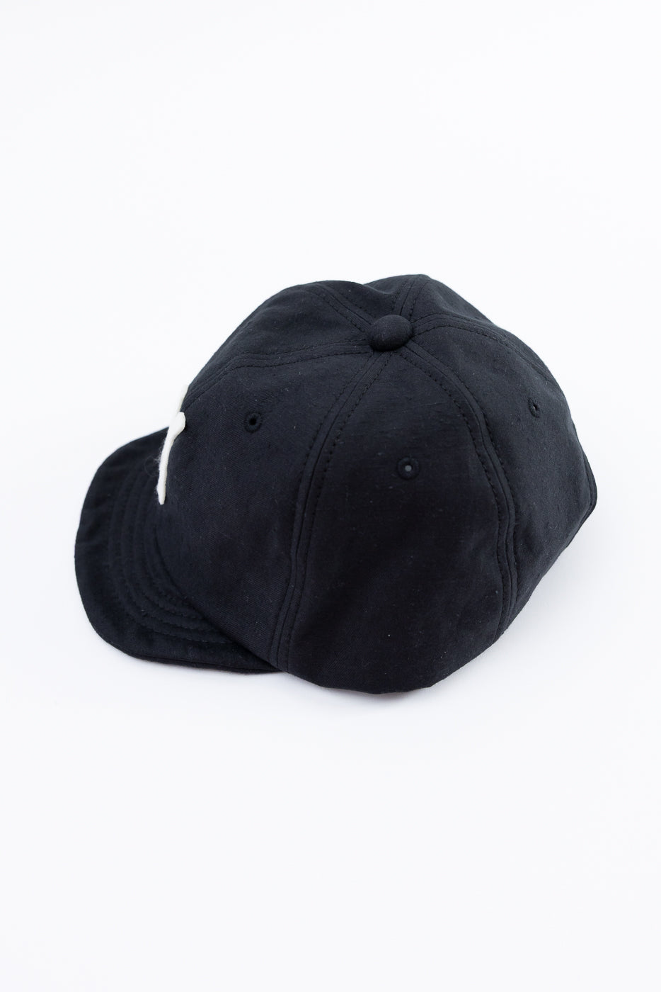 Black cap on a white background