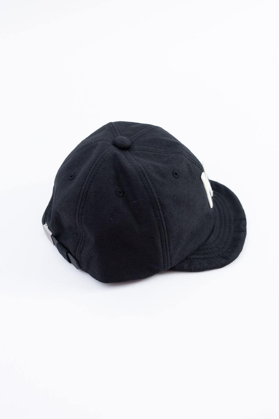 Black cap on a white background