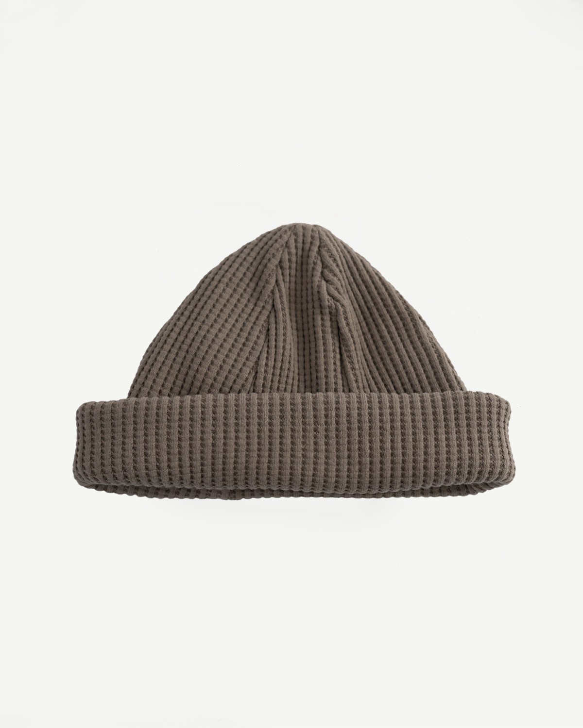 Front view flat lay of sepia waffle knit beanie, textured cuff, contemporary casual style