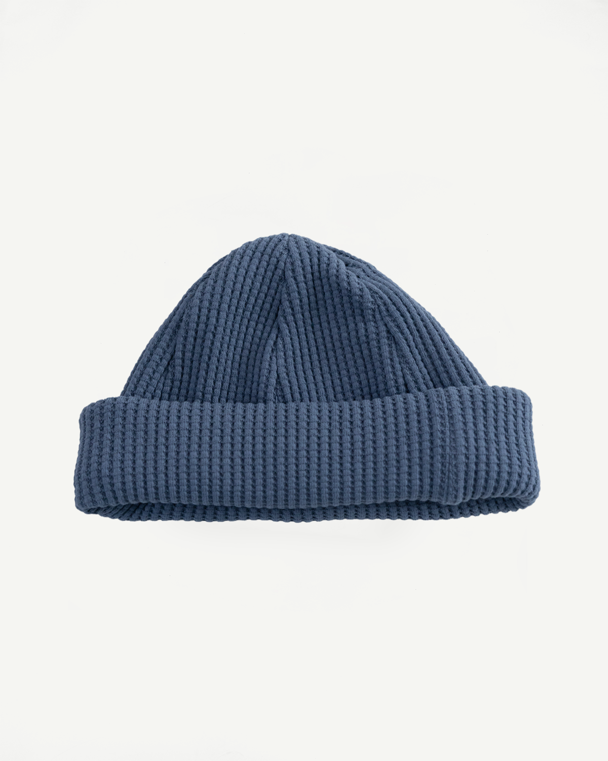 Front flat lay of Jackman JM6605 retro saxe blue waffle knit cap, showing ribbed texture and cuff.