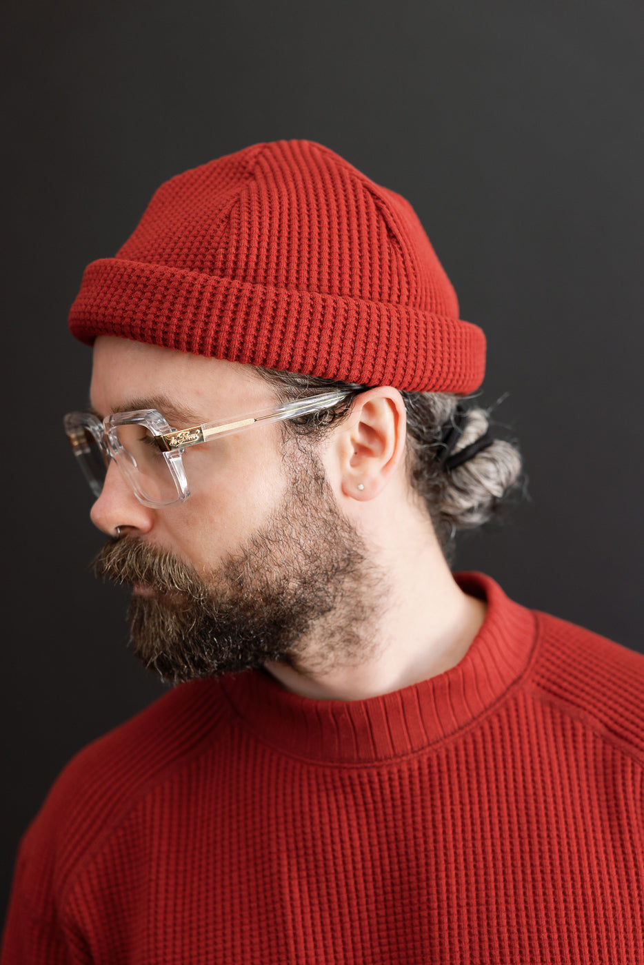 Close-up side view of a male model (5'9
