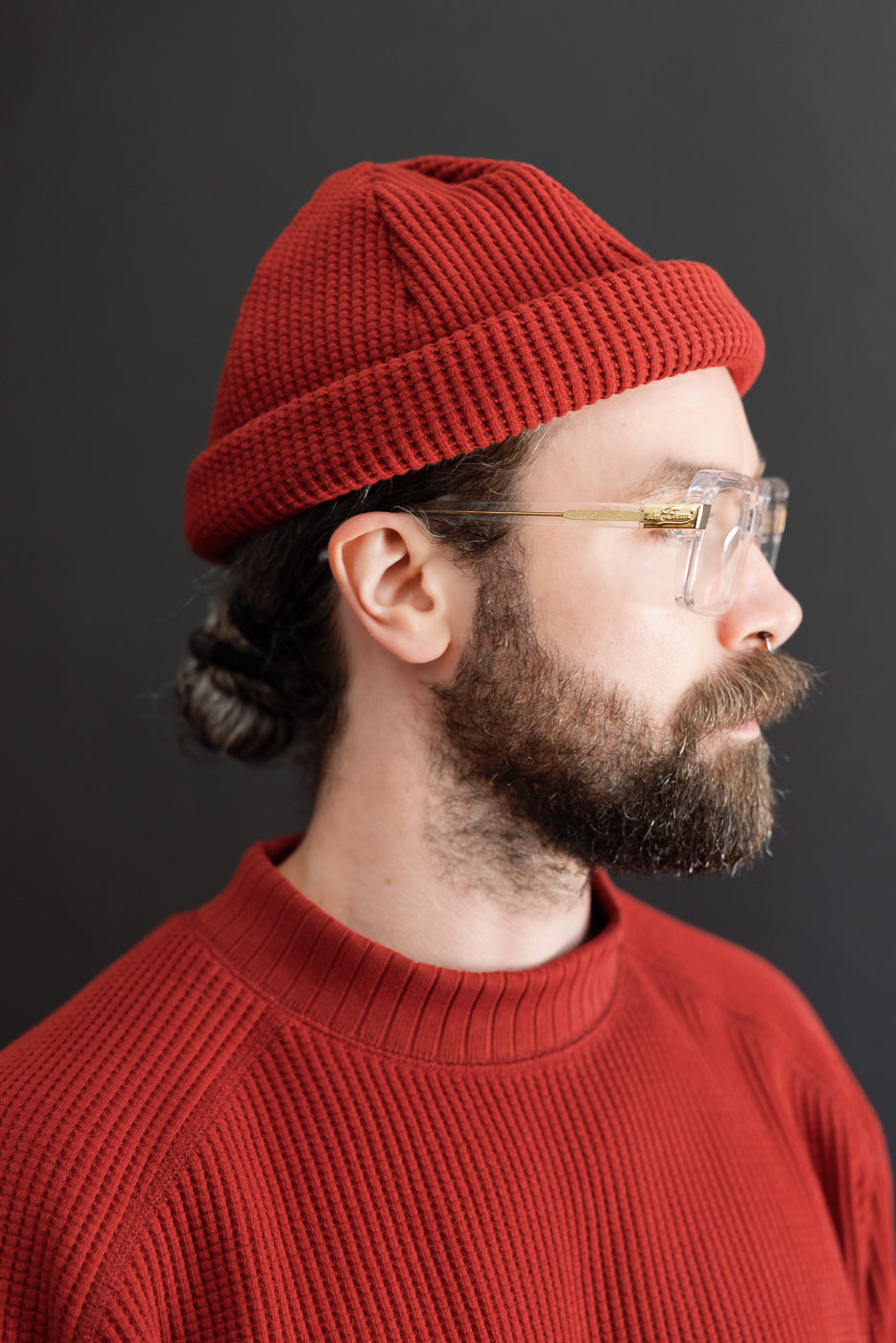 Close-up side view of a male model, 5'9
