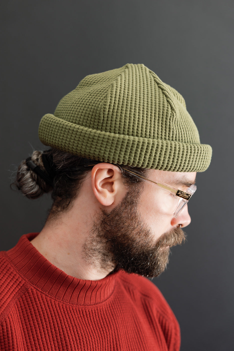 Close-up profile of a male model (5'9