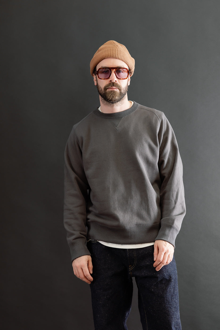 Full body front view of a male model, 5'9